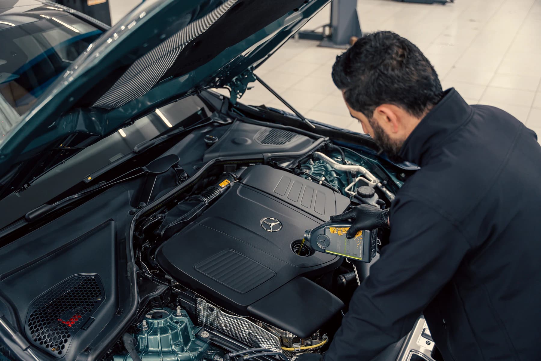 A mechanic inspecting a car engine
